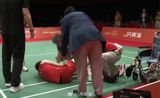 China's Badminton Pair Loses the Asian Games Final After Playing Through Injury